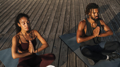 Man and woman meditating | Ustawi Health Bazaar Kenya